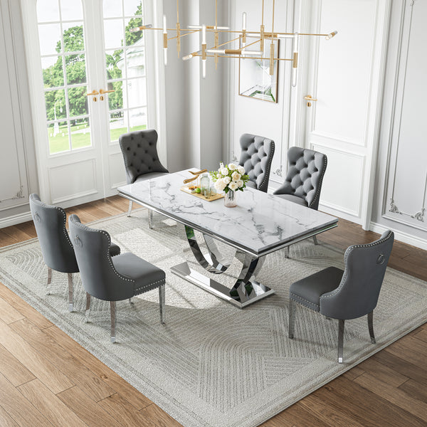 69 Inch 7 Piece U Shaped Pedestal Dining Set with Gray Velvet Chairs Silver Base Detail View